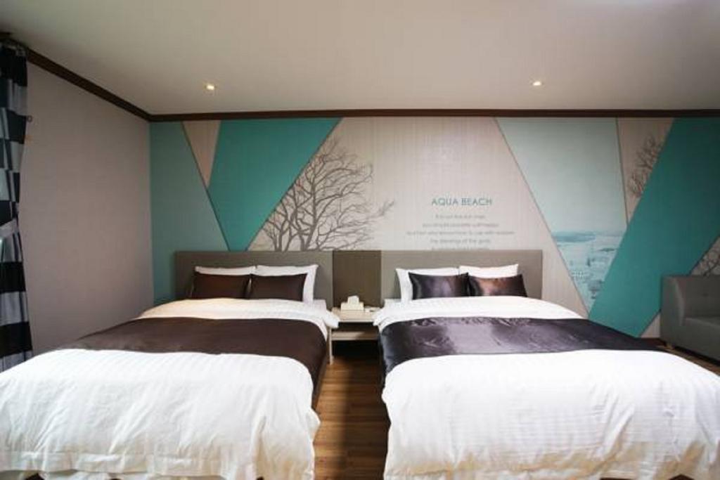 Seongsan Aqua Beach Hotel Seogwipo Værelse billede