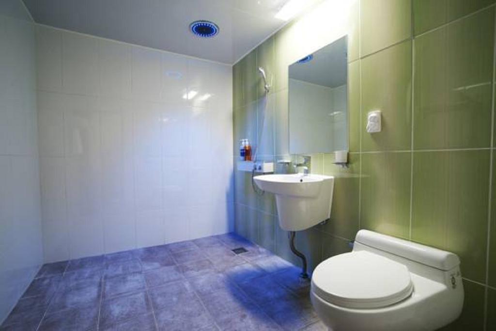 Seongsan Aqua Beach Hotel Seogwipo Værelse billede